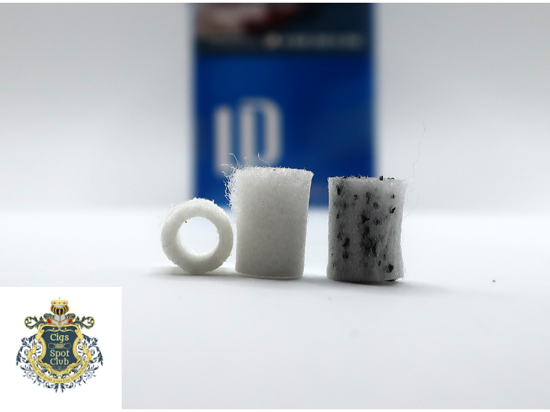 LD Blue Compact in hand while smoking